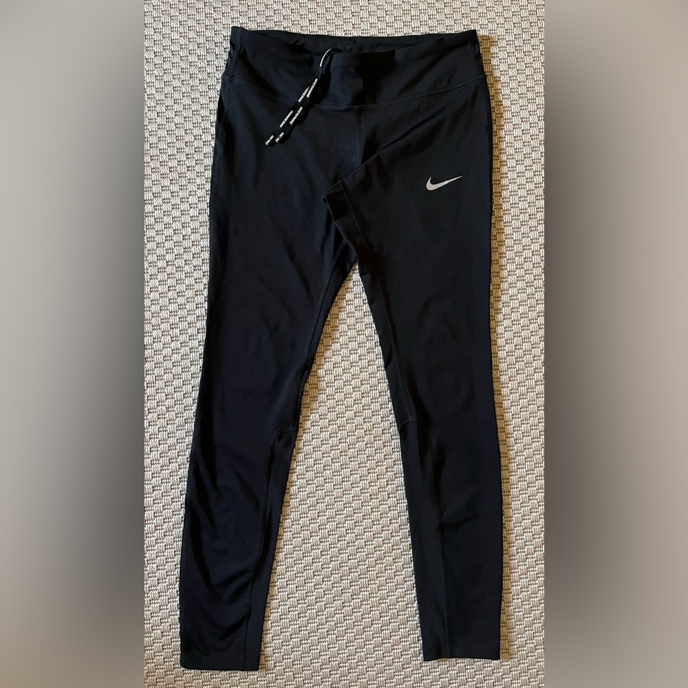 Preowned- Nike Women’s Black Running Leggings with small zipper pocket - size M